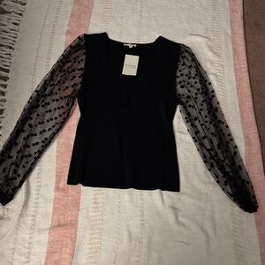 Eesome Elegant Black Top with Sheer Polka Dot Sleeves